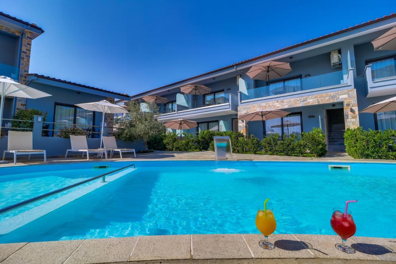 Theros Villas & Suites Chrysi Ammoudia Bagian luar foto
