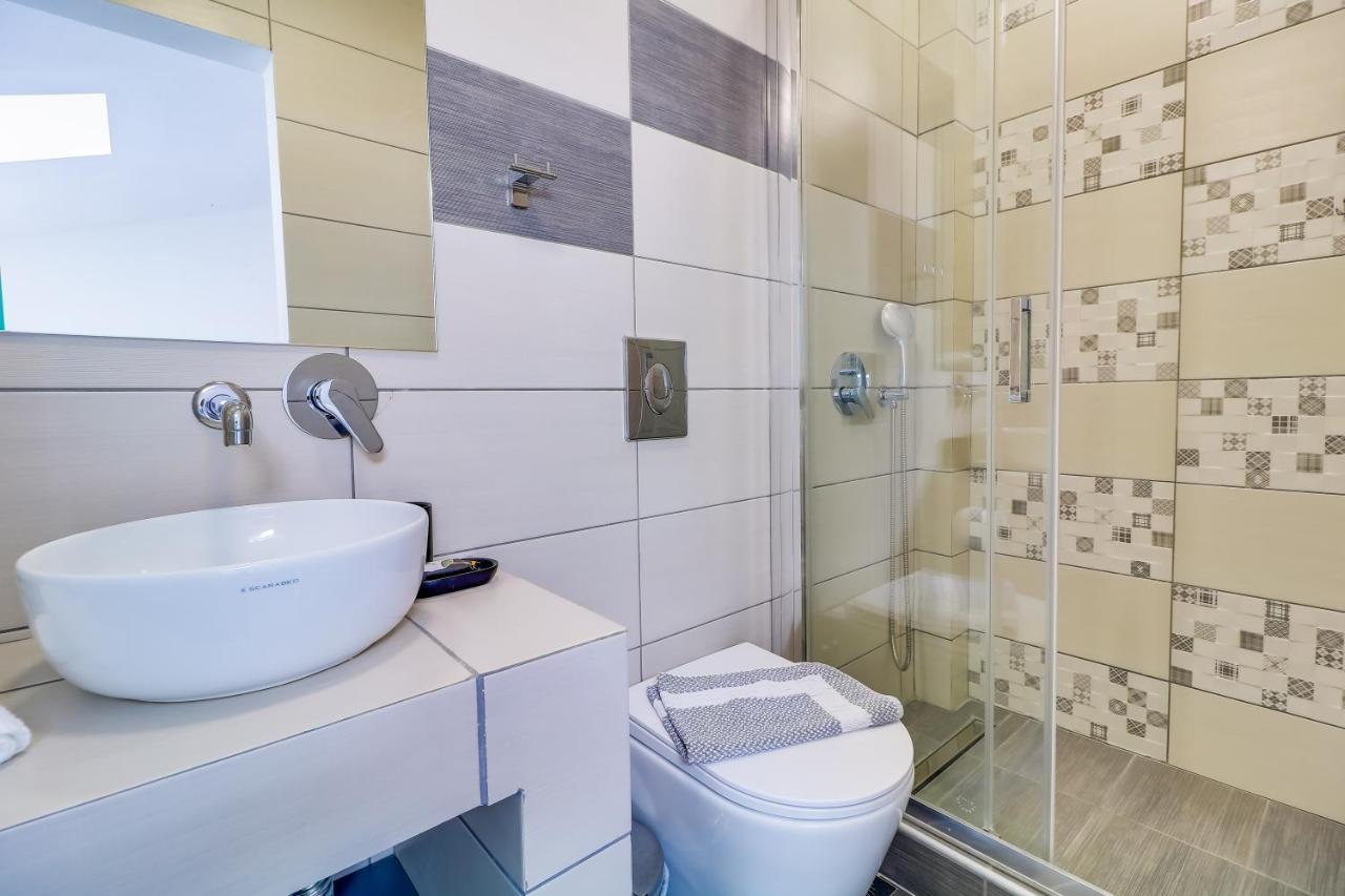 Theros Villas & Suites Chrysi Ammoudia Bagian luar foto