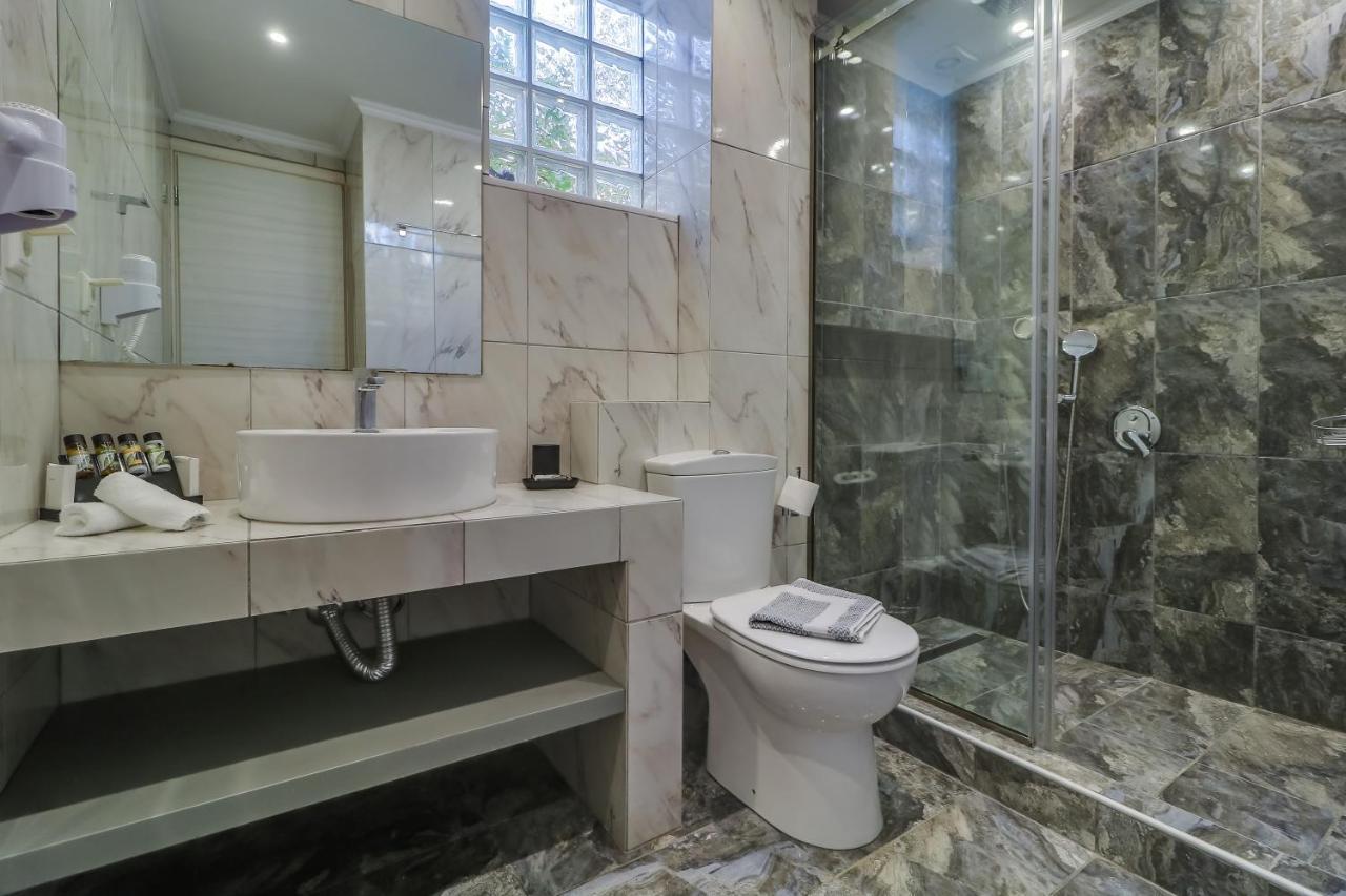 Theros Villas & Suites Chrysi Ammoudia Bagian luar foto