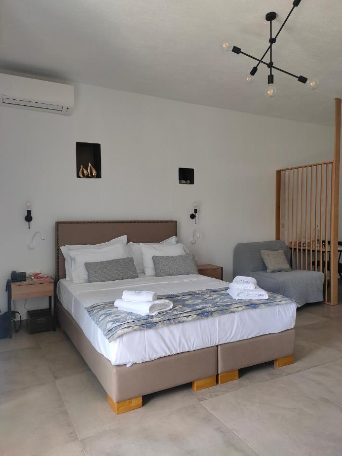 Theros Villas & Suites Chrysi Ammoudia Bagian luar foto